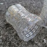 Duo of vintage molded glass globe pendant lights.