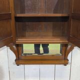 Early 20th-century English wall shelf in walnut.