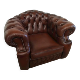 Curved brown leather chesterfield armchair