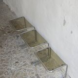 Nesting tables in chrome and smoked glass from the 70s