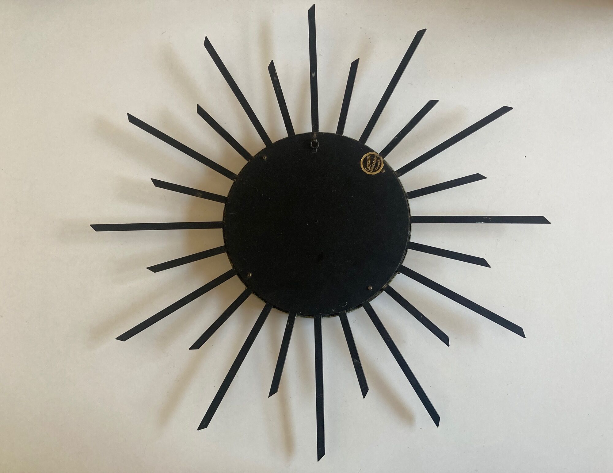 Sun mirror 1960 in patinated brass and black rays 50cm