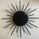 Sun mirror 1960 in patinated brass and black rays 50cm