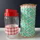 Vintage celadon green scoubidou vase with rattan — 1960s-70s