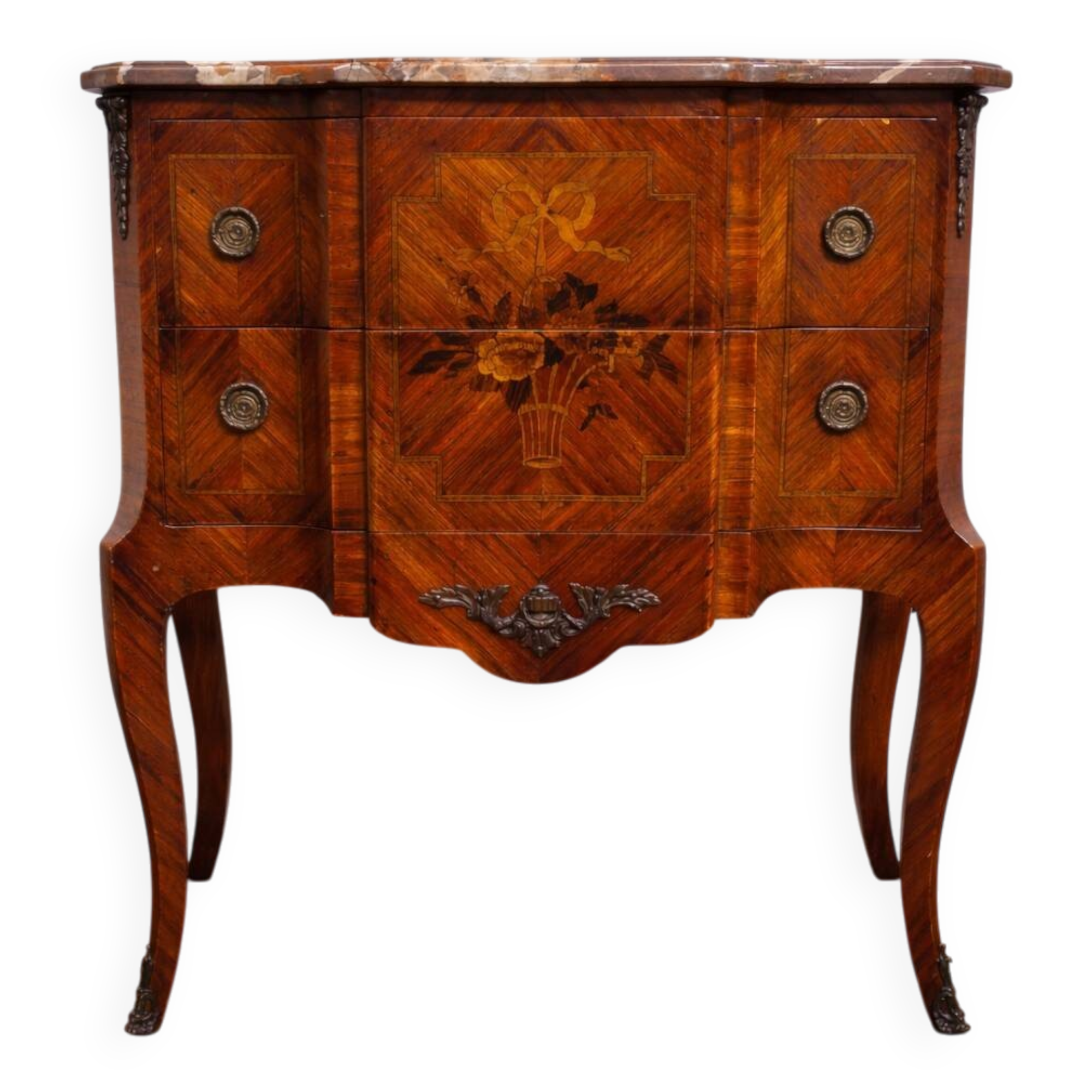 Louis XV style commode with a projection in marquetry.