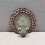 Wall-mounted candlestick in grayish colors, Danish and from the 1970s-80s.