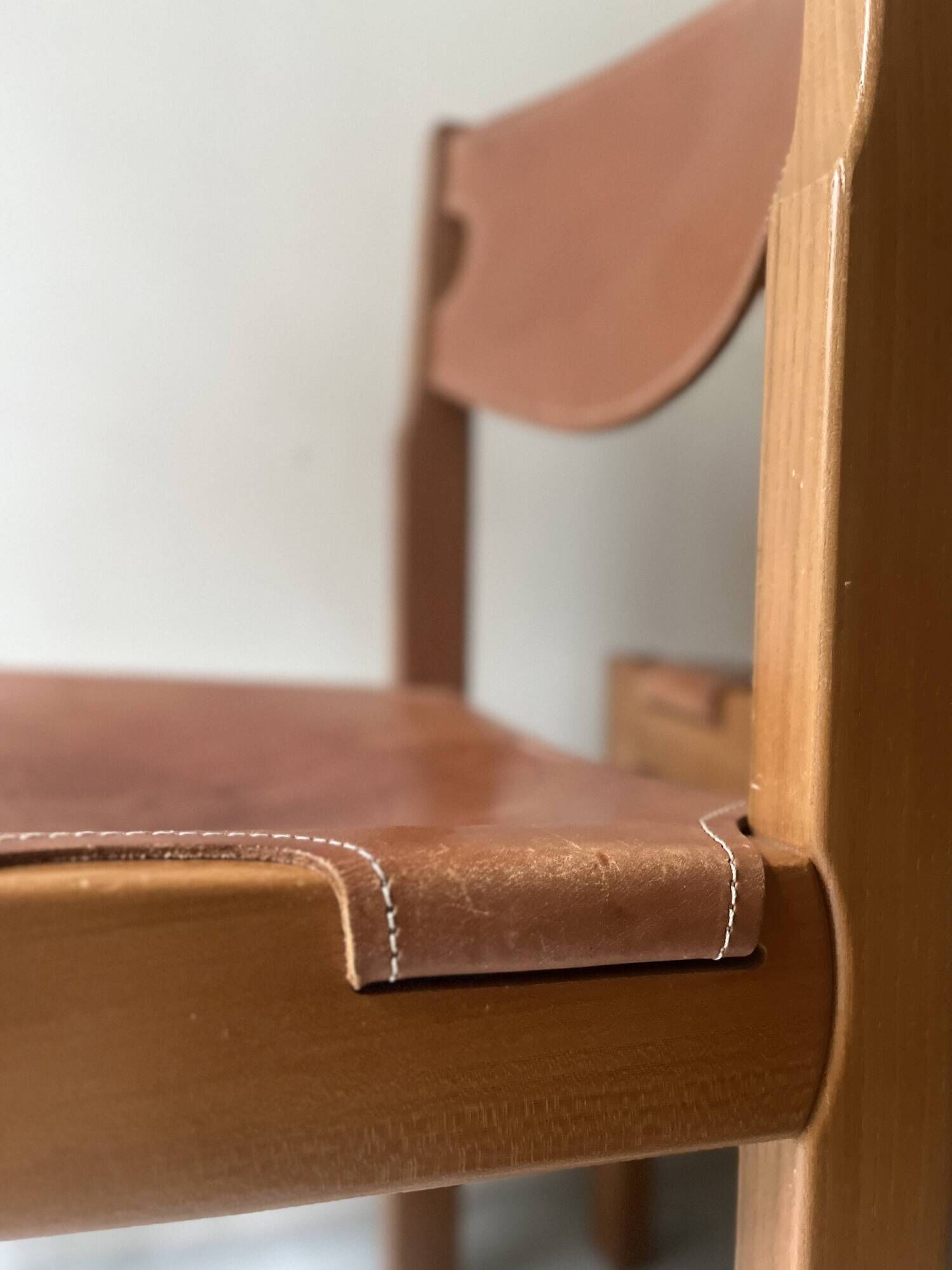 elm wood and camel leather chair Maison Regain, French design 1960