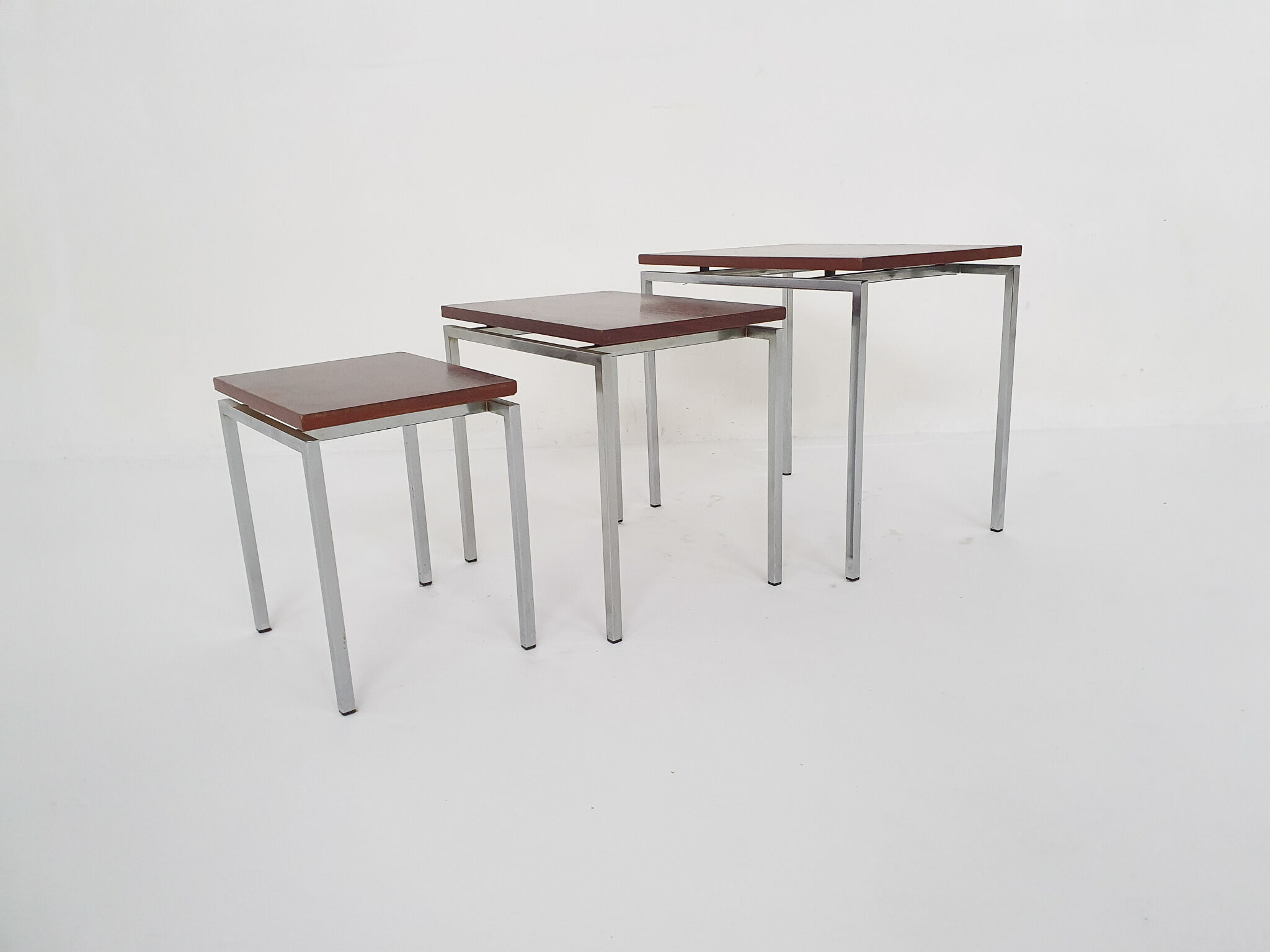 Rosewood and metal nesting tables, The Netherlands 1960's