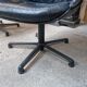 Pair of Comforto armchairs in black leather. Vintage 70s.