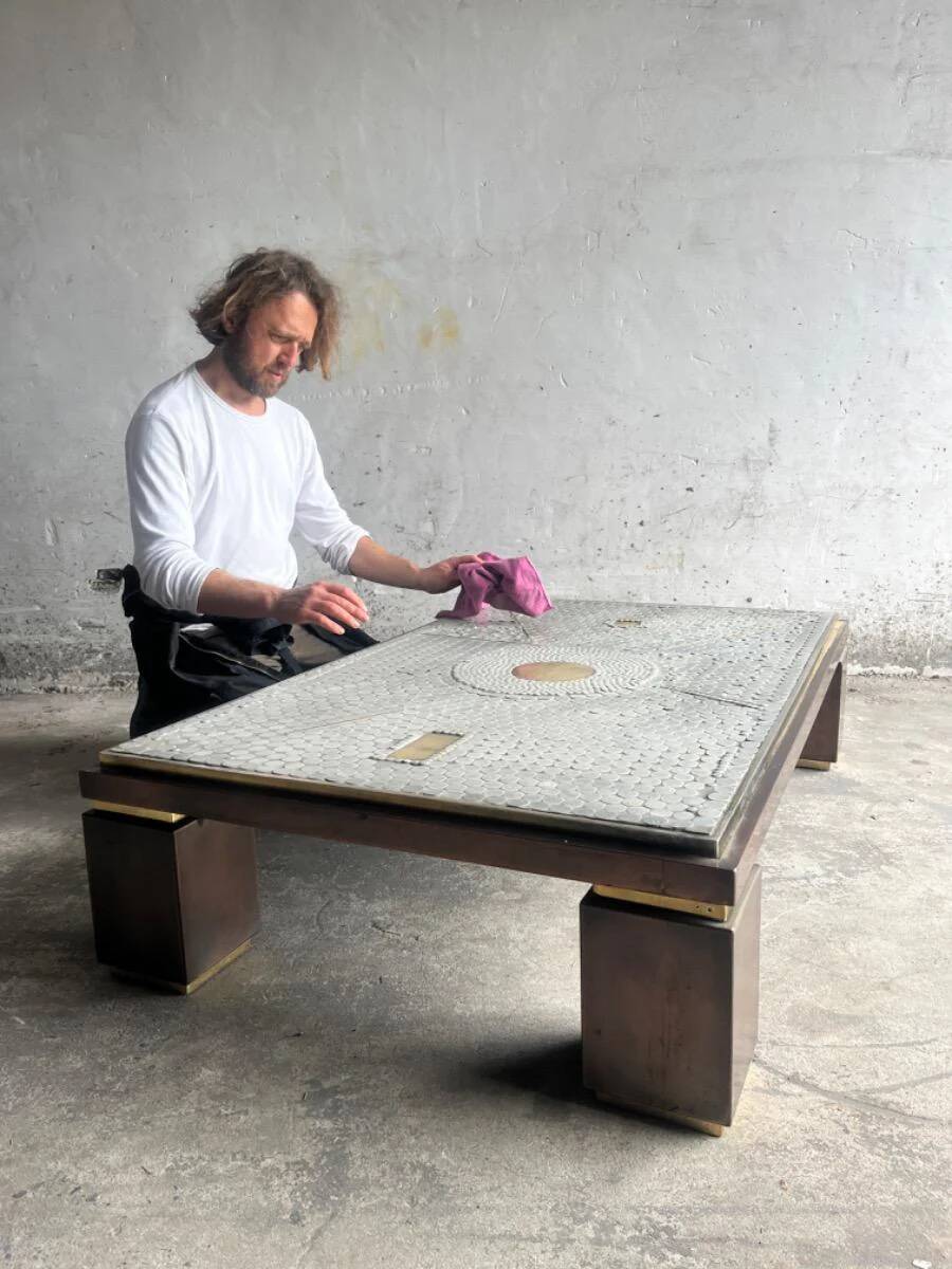 Grey ceramic mosaic top coffee table with dark wood base and brass accents, 1970s
