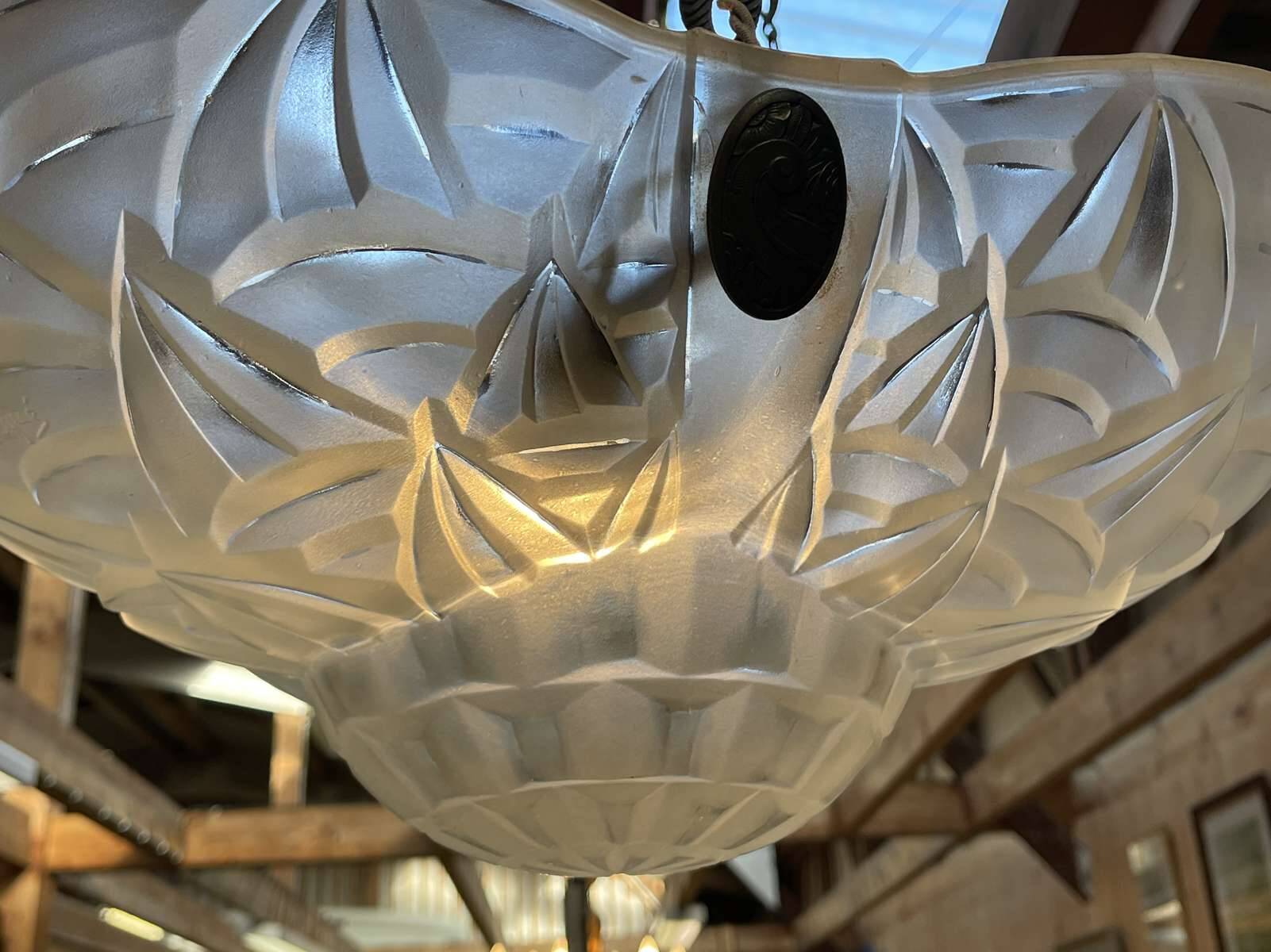 Art Deco suspension in moulded-pressed glass with geometric decoration signed Degué.