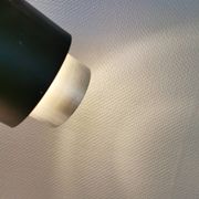 A set of beautiful cylinder shaped hanging lamps in silver color with black "ring" Danish 1970s.