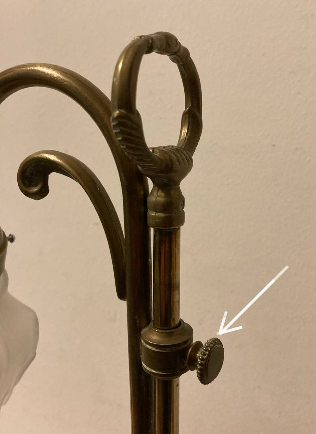 Brass table lamp with a glass shade