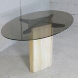 Living table, Comblanchian stone base and elliptical tray in smoked glass, Italy, 1970