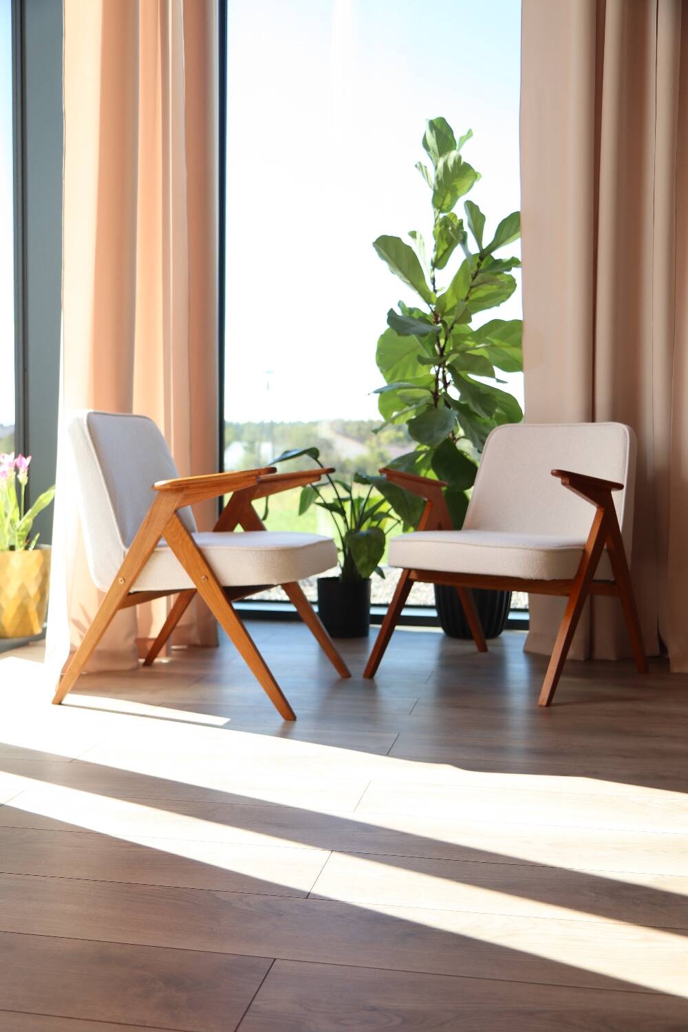 Pair of vintage white bouclé armchairs