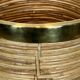 Rattan and brass wastepaper basket in the style of Gabriela Crespi.