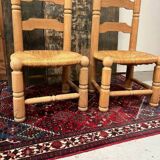 Pair of Dudouyt straw chairs