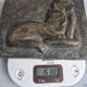 Bas-relief plaque of a rabbit in brown patina, seated cat