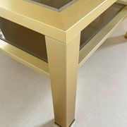 Table basse grand modèle en métal doré, France années 70