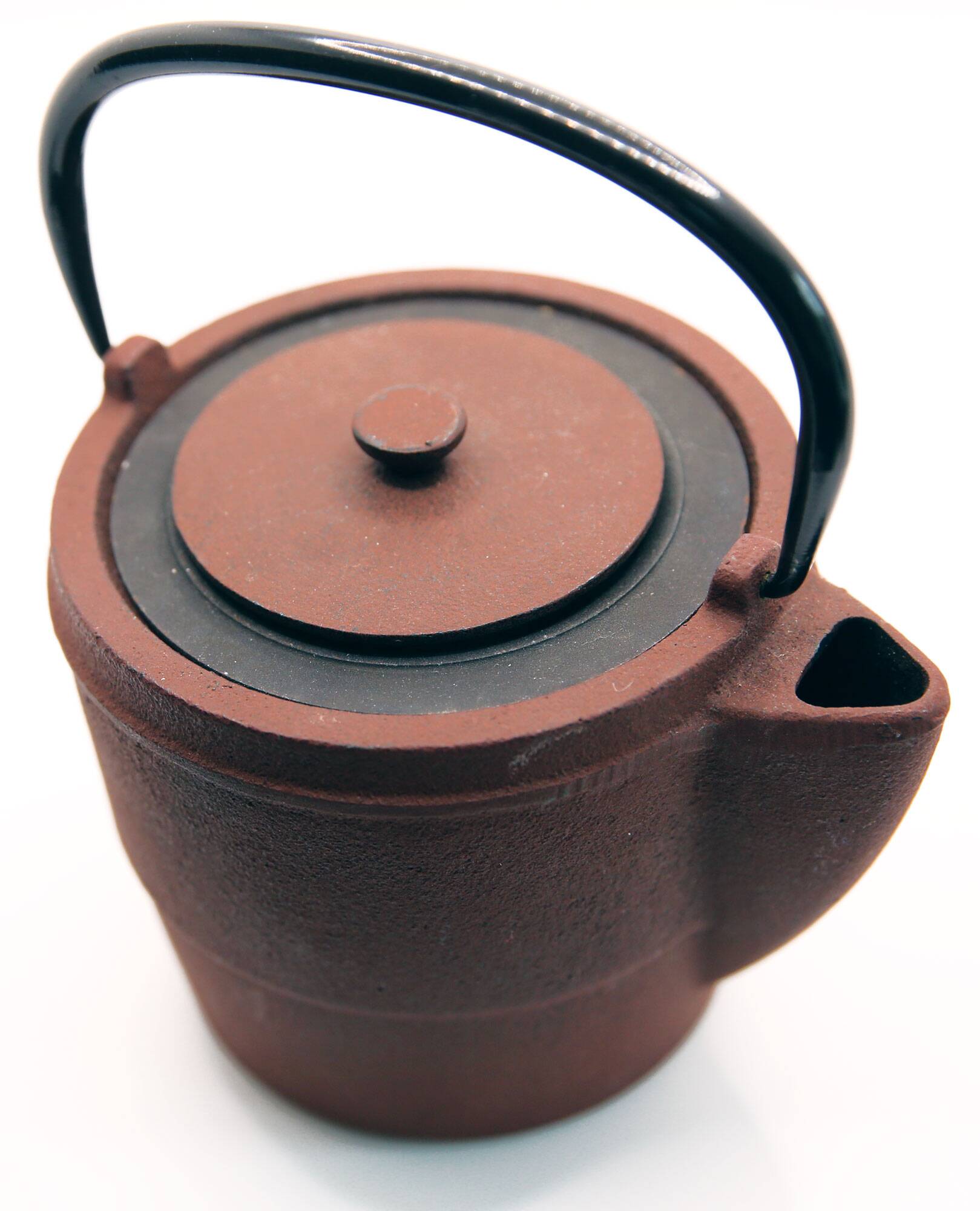 Cast iron chocolate teapot from Japan wabi sabi and its stainless steel filter