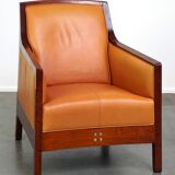 Fauteuil design artdeco en cuir de vache. grand confort et détails uniques