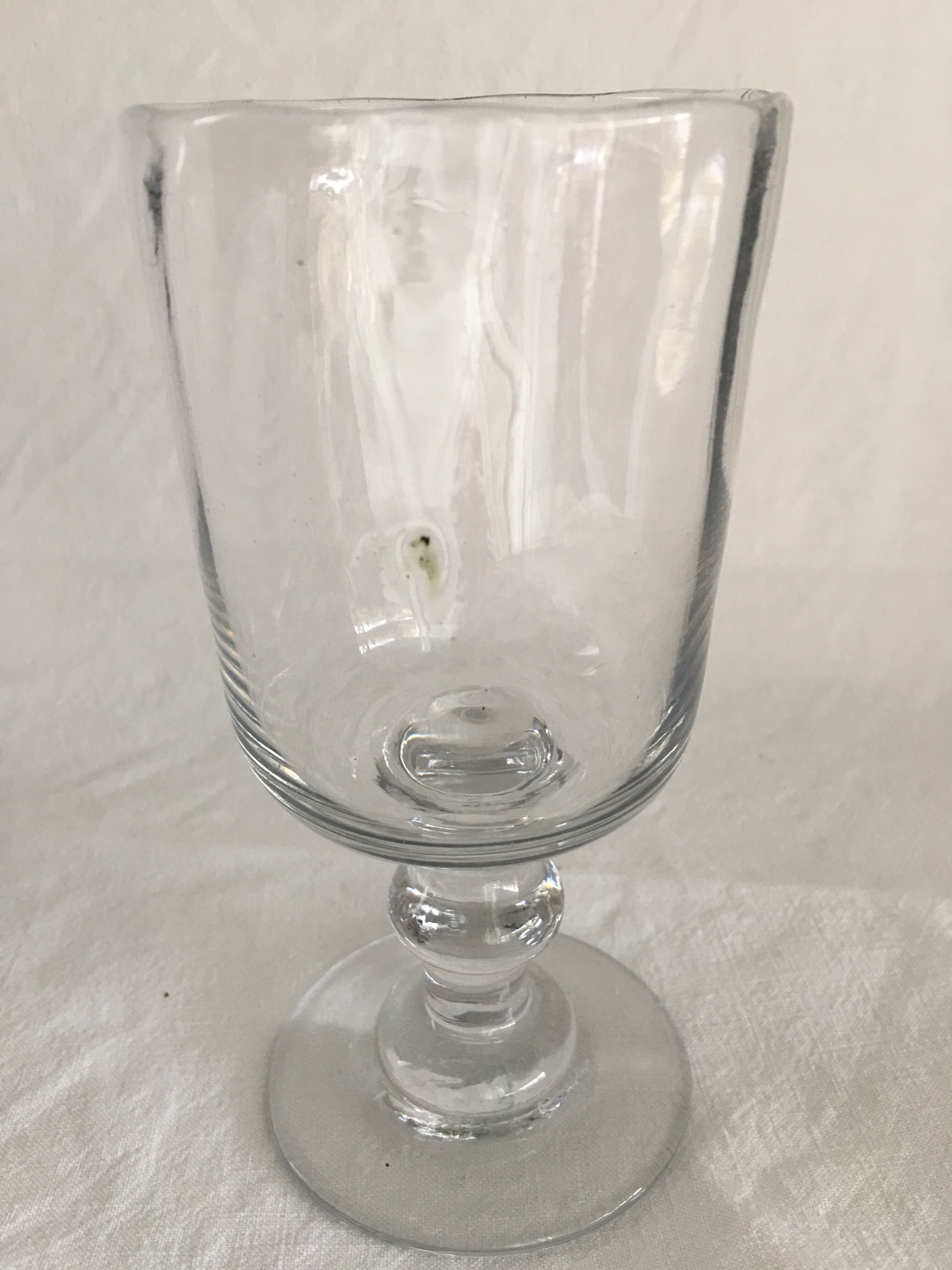 Glass on foot - blown glass bubble late nineteenth early twentieth