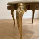 Baroque style coffee table with marble and gilded wood.