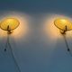 Pair of green plexiglass and gold metal wall lights by Erco, 1950s, Germany.