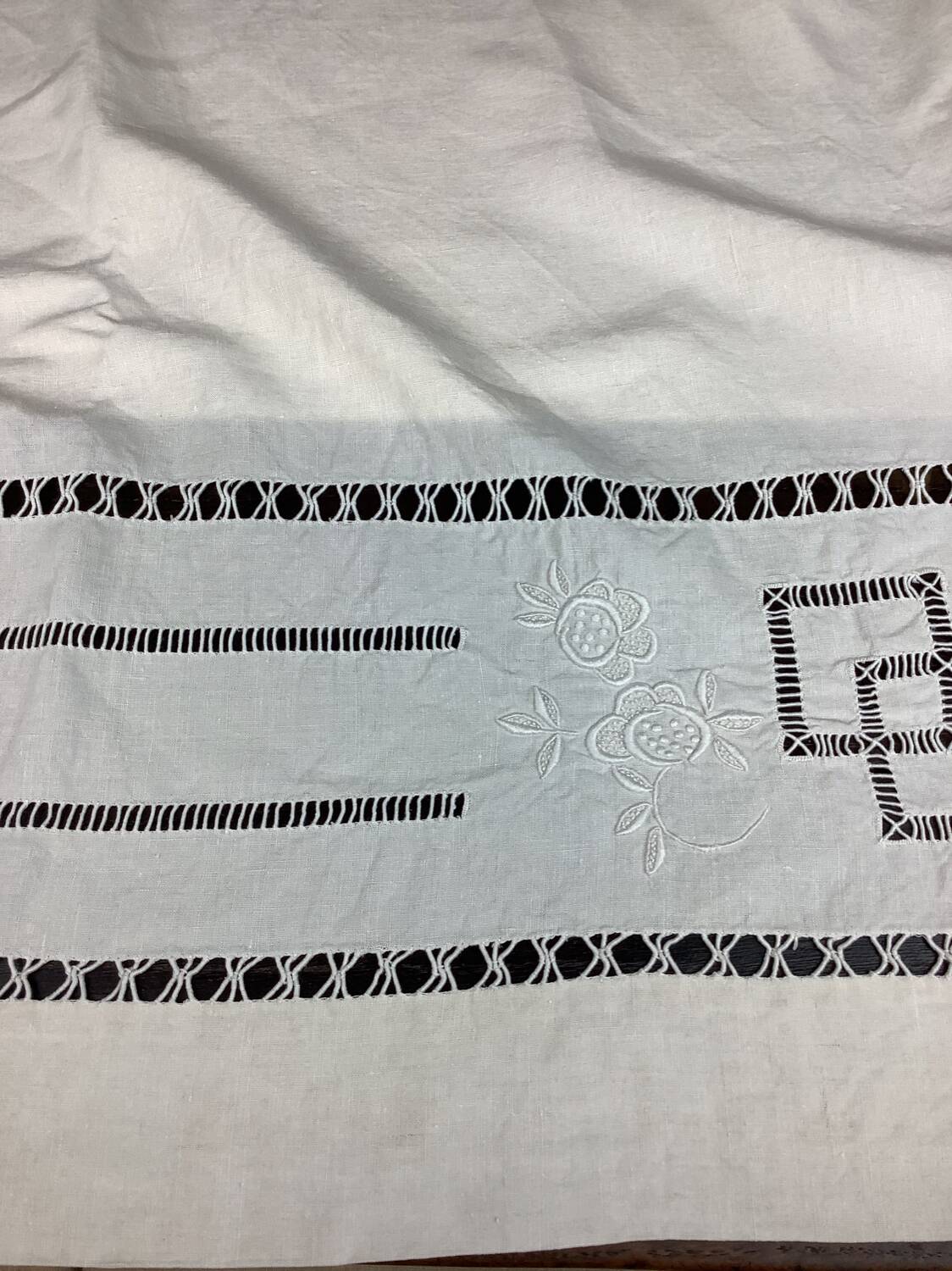 Old linen sheet with monogram embroidery