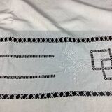 Old linen sheet with monogram embroidery