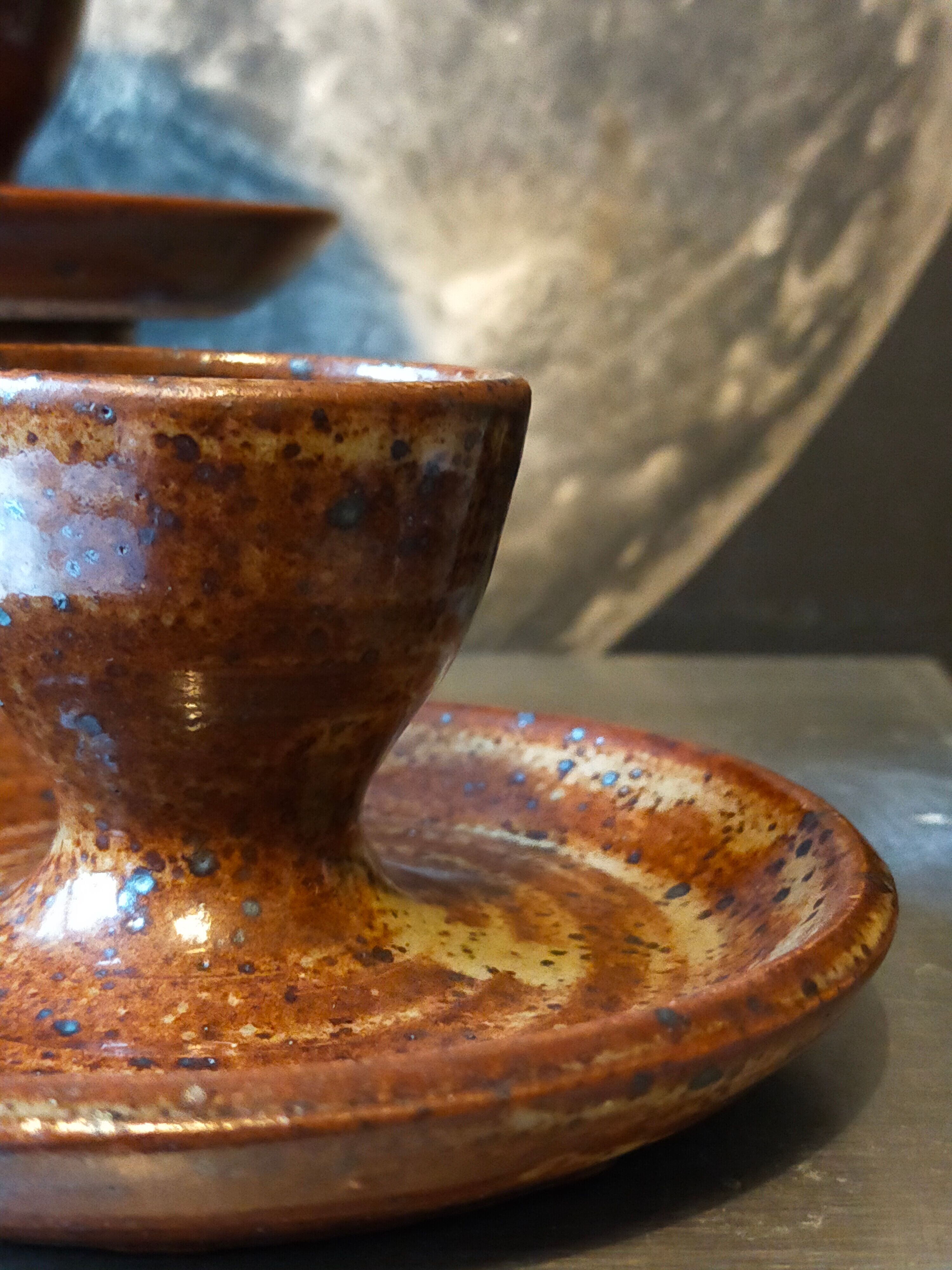 Four pyrite stoneware shells