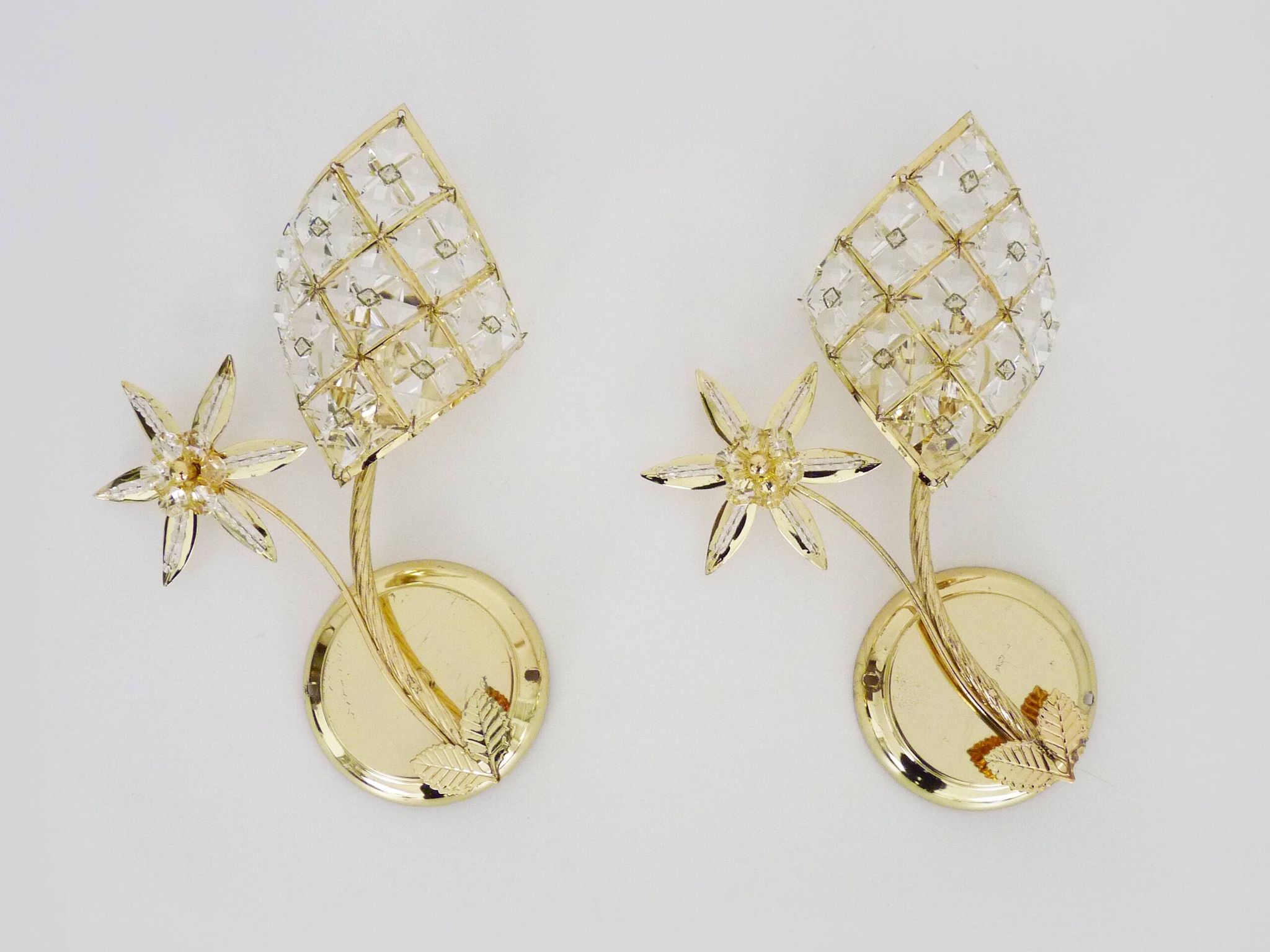 Pair of vintage floral wall sconces in gold metal and tassel
