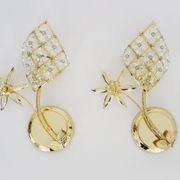 Pair of vintage floral wall sconces in gold metal and tassel