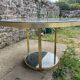 Round dining table with green marble and solid brass.