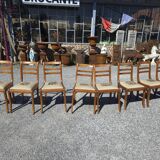 8 chaises en merisier avec assises brodées