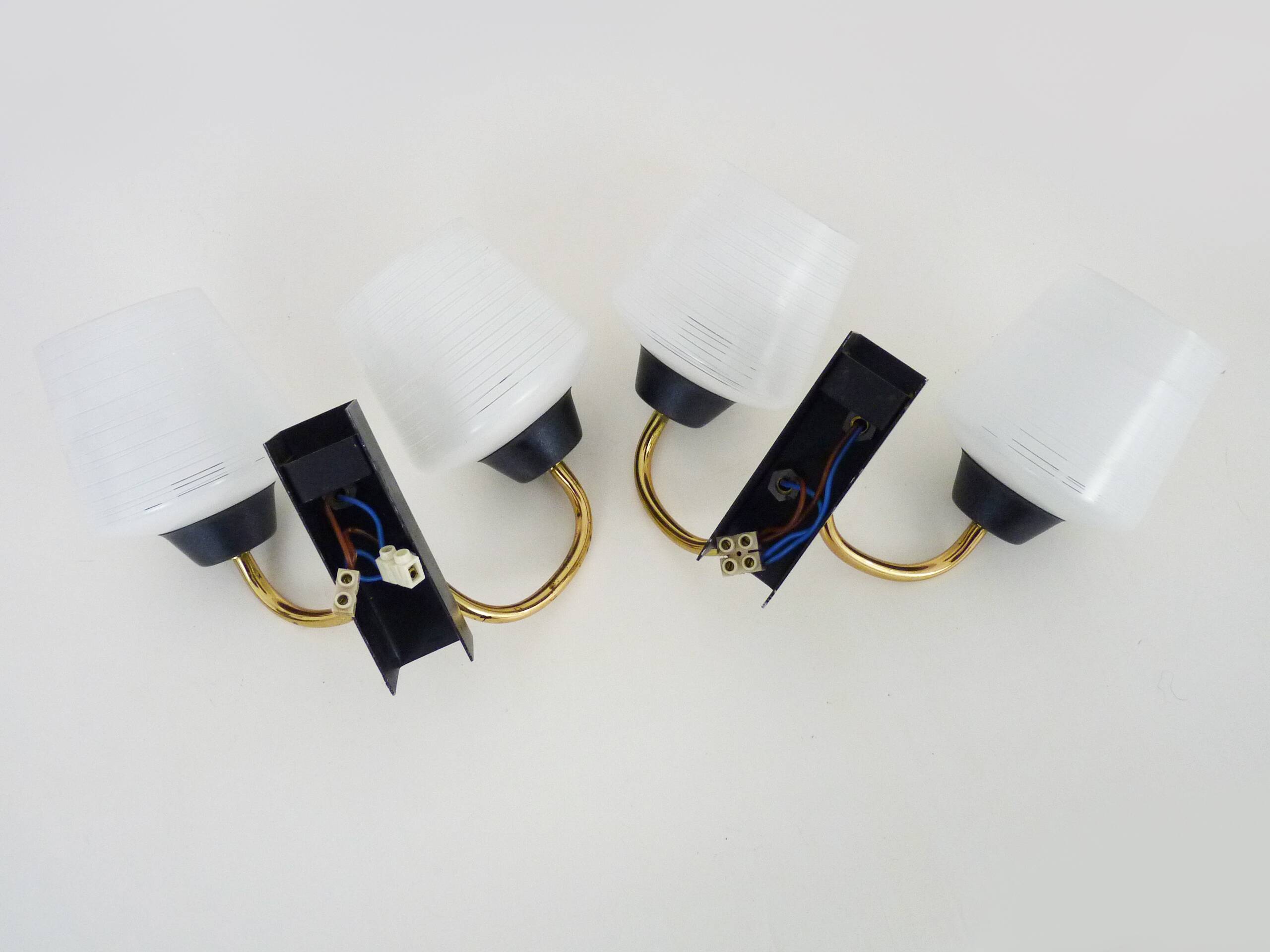 Pair of vintage Maison Arlus wall lights from the 1950s in brass, glass globe.