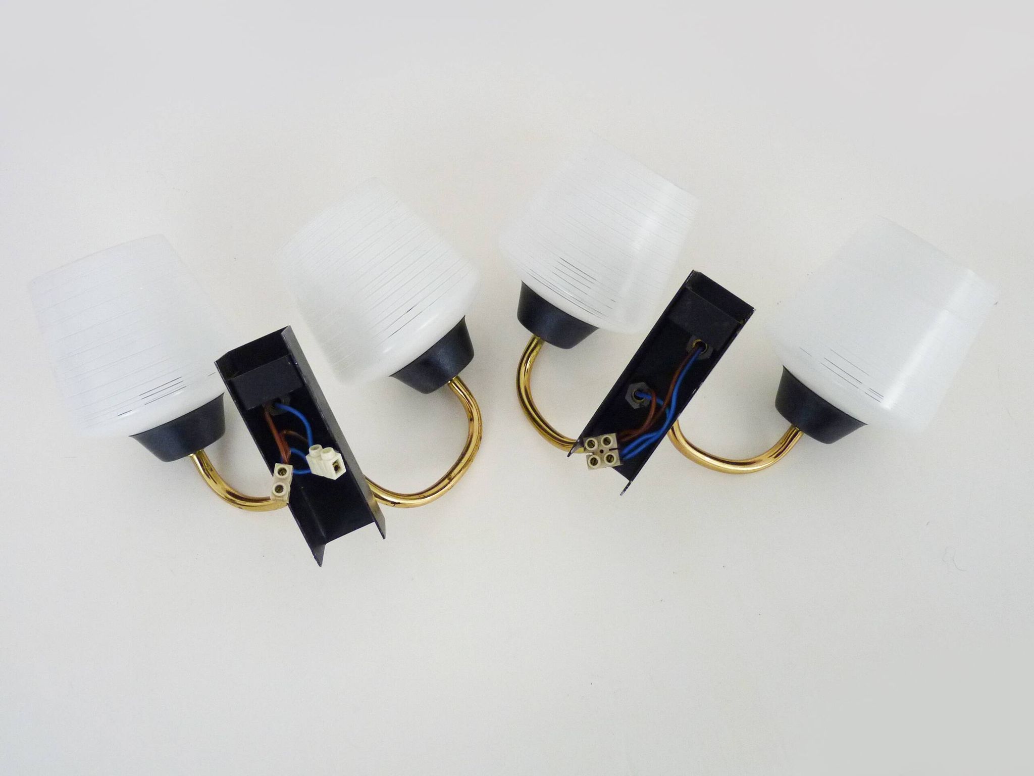 Pair of vintage Maison Arlus wall lights from the 1950s in brass, glass globe.