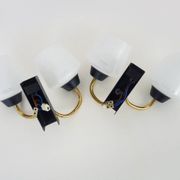 Pair of vintage Maison Arlus wall lights from the 1950s in brass, glass globe.