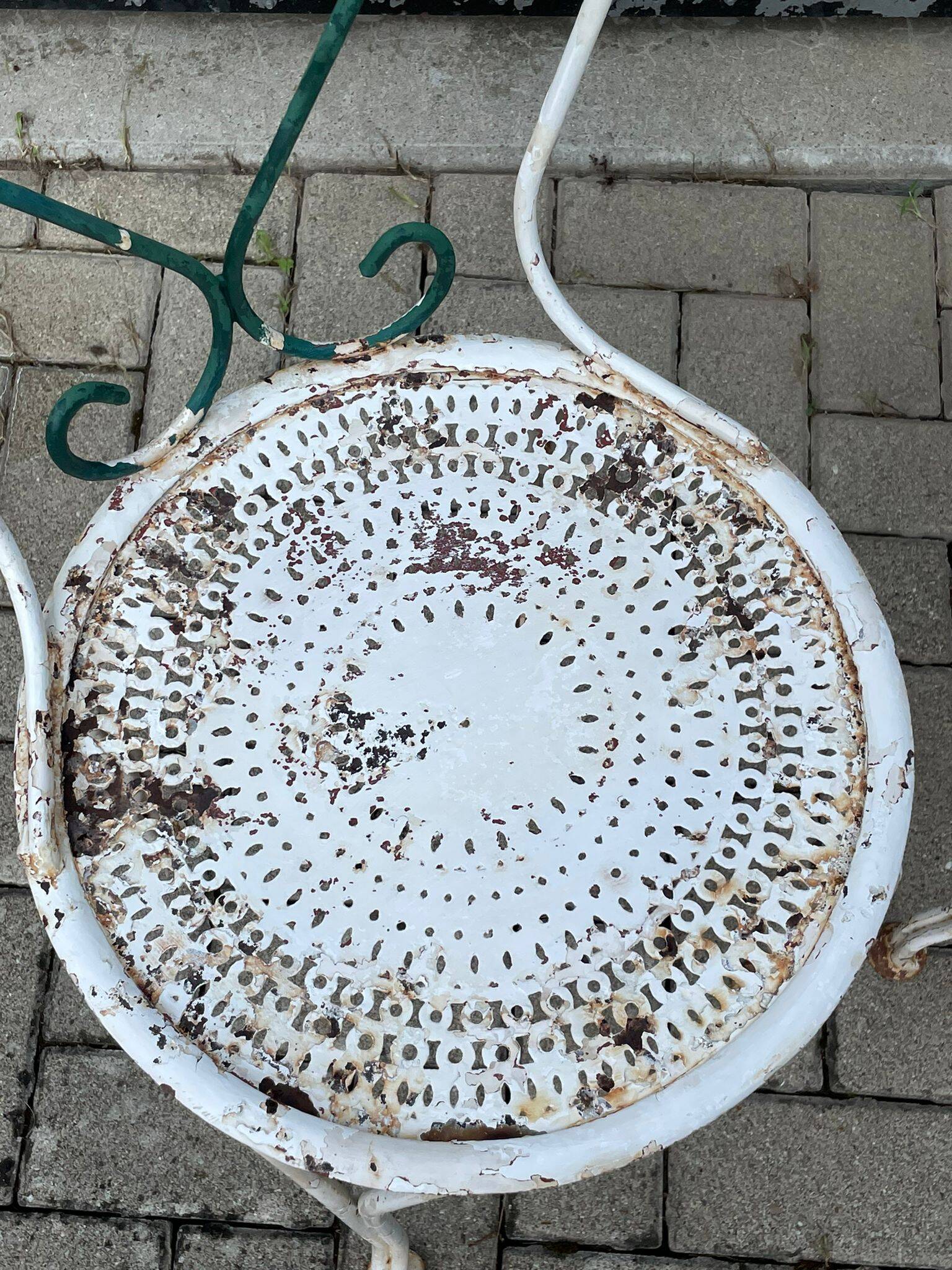 pair of antique wrought iron garden chairs