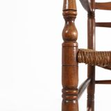 Antique wooden armchair with cane seat, France ca. 1900