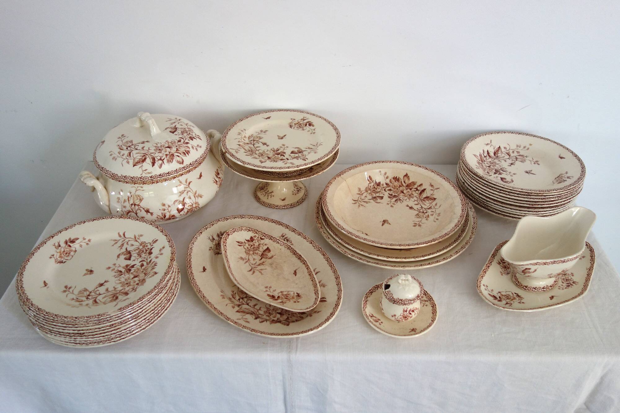 11 flat plates Terre De Fer Gien model Mai circa 1900