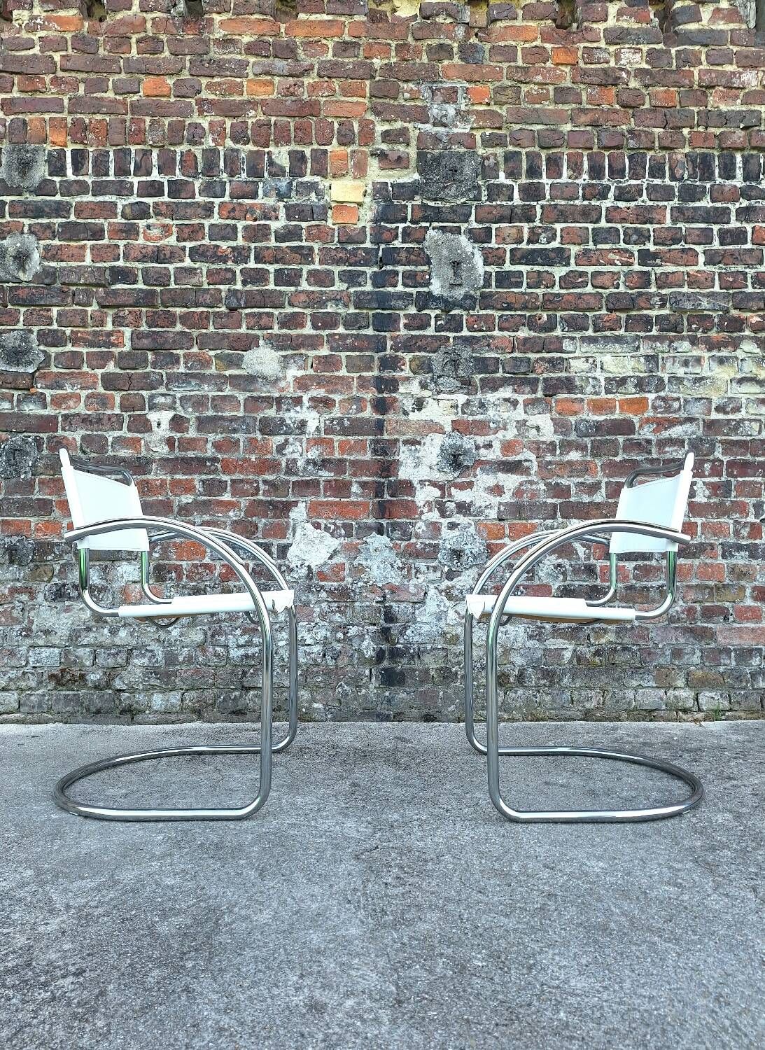 Pair of vintage tubular armchairs, designer seating furniture