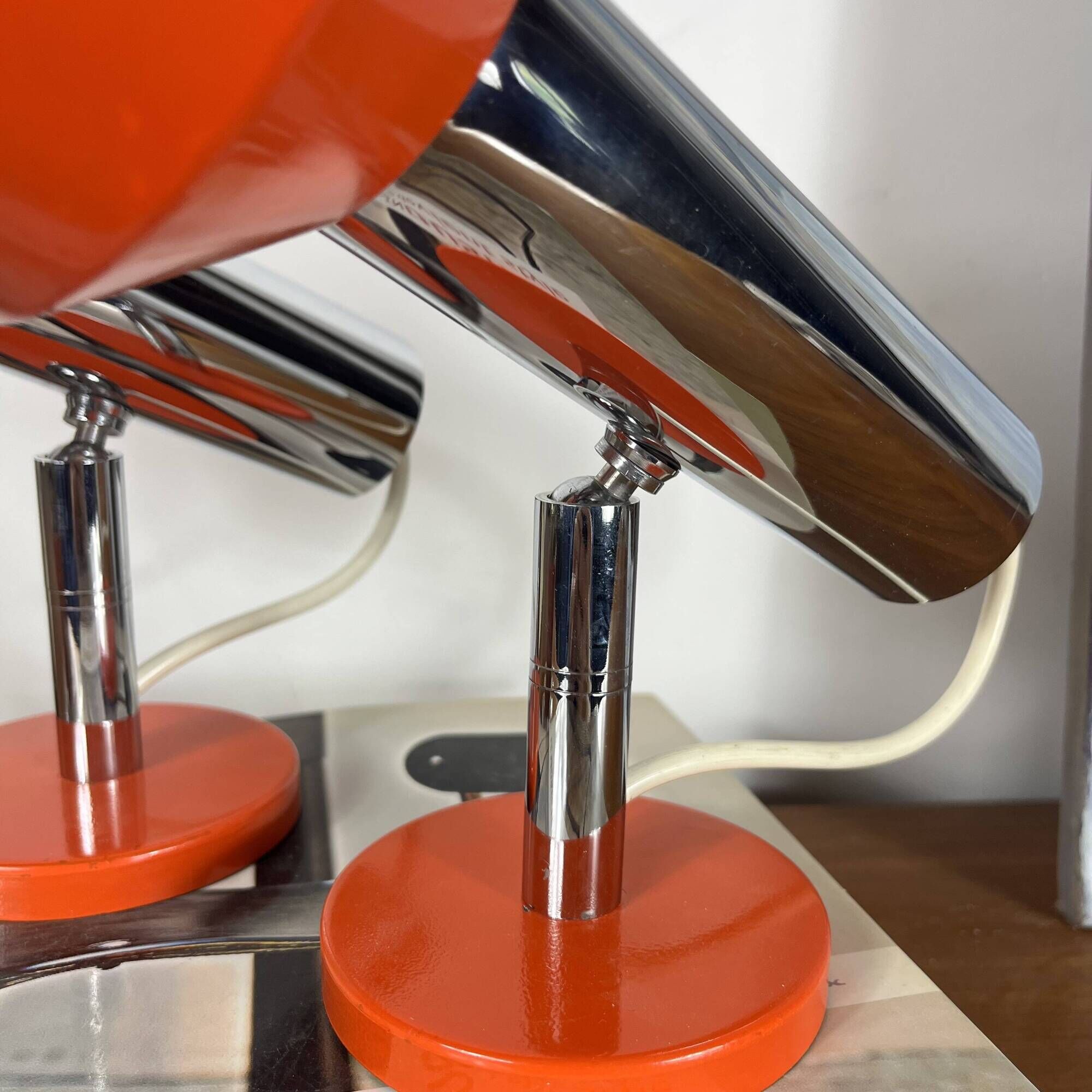 Pair of orange aluminium wall spotlights from the seventies.