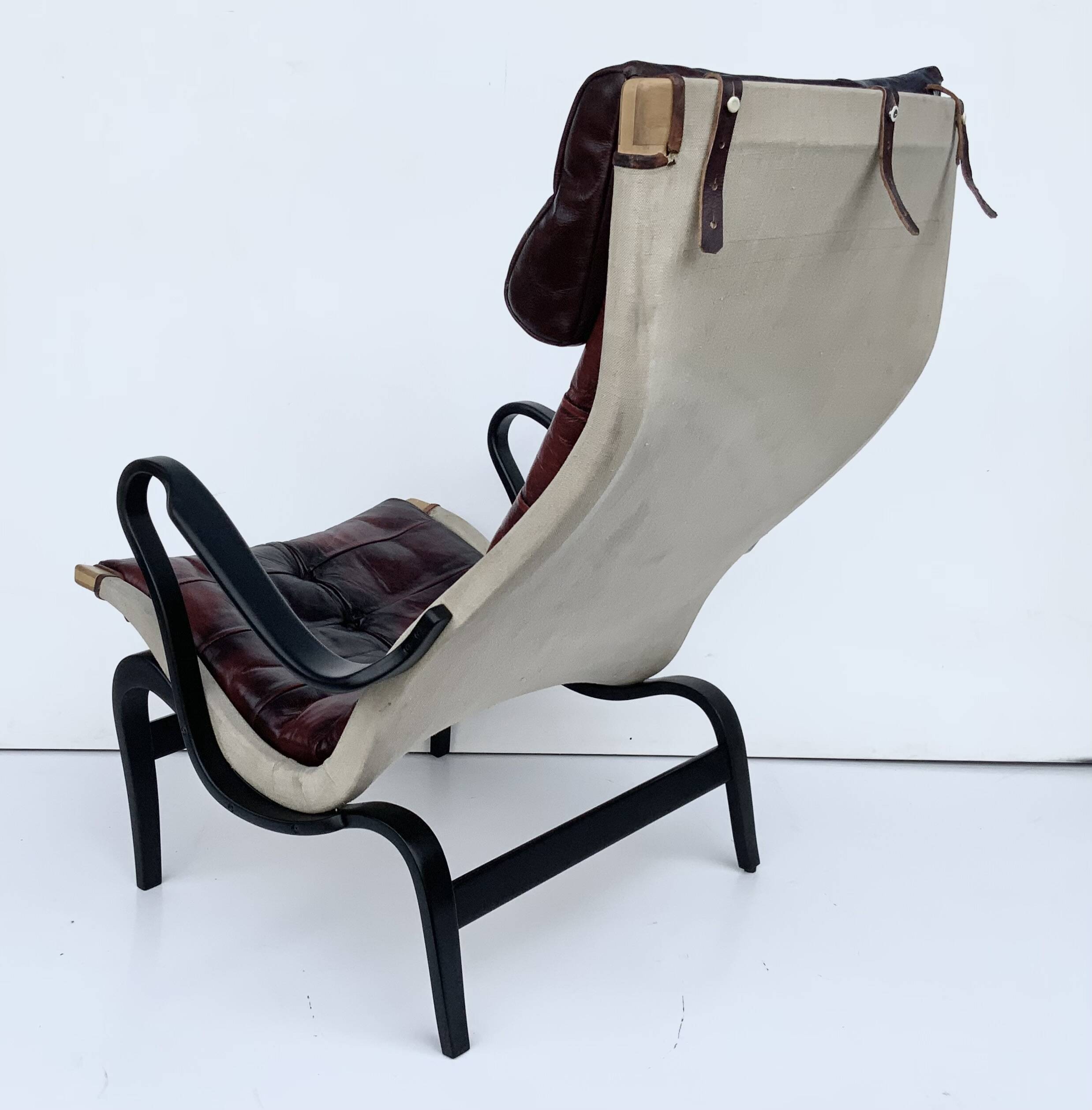 Vintage Pernilla 69 Armchair by Bruno Mathsson for Dux In Oxblood Leather