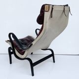Fauteuil vintage Pernilla 69 de Bruno Mathsson pour Dux en cuir sang de bœuf