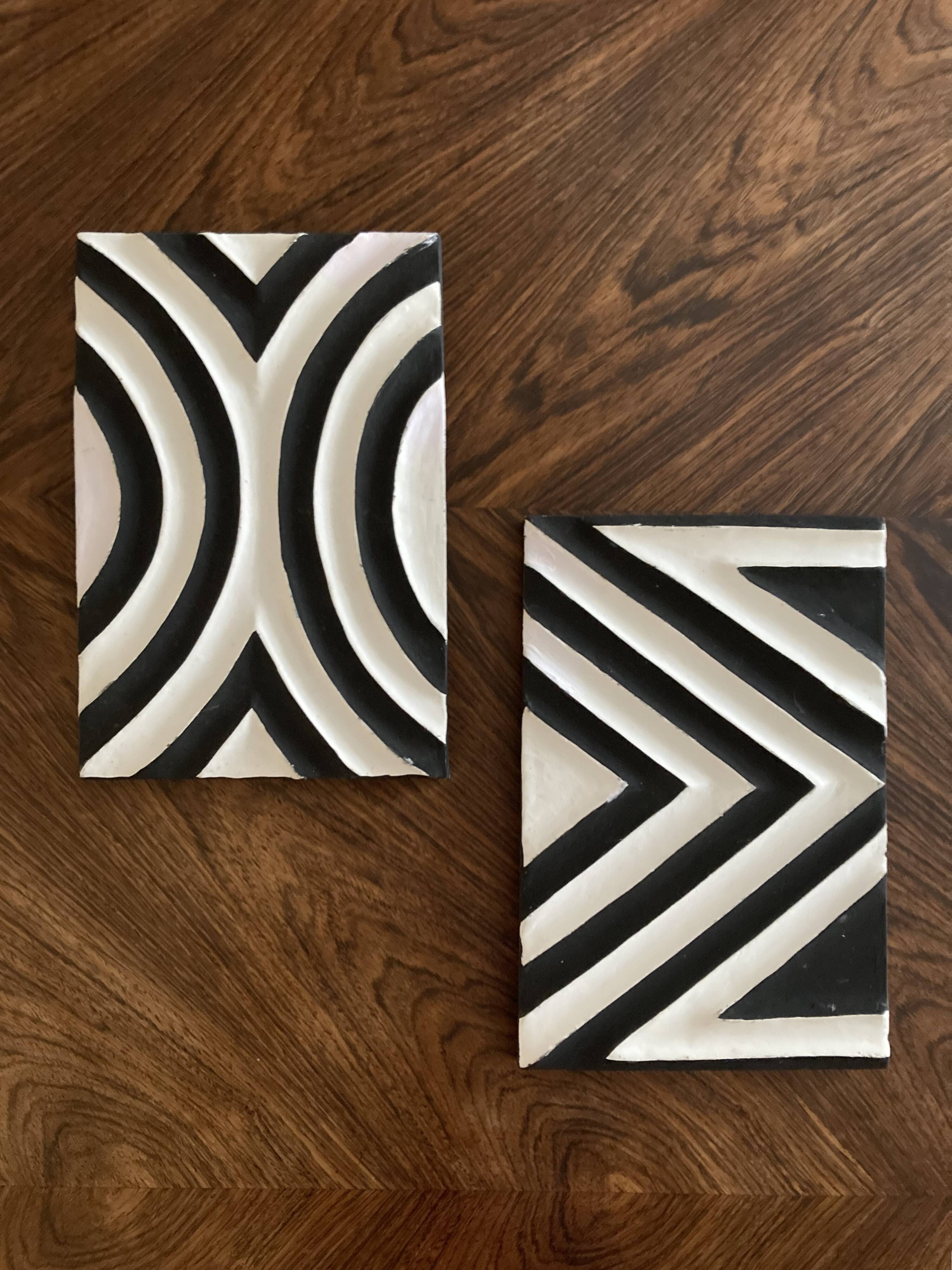 Two Imigongo paintings / panels traditional art from Rwanda