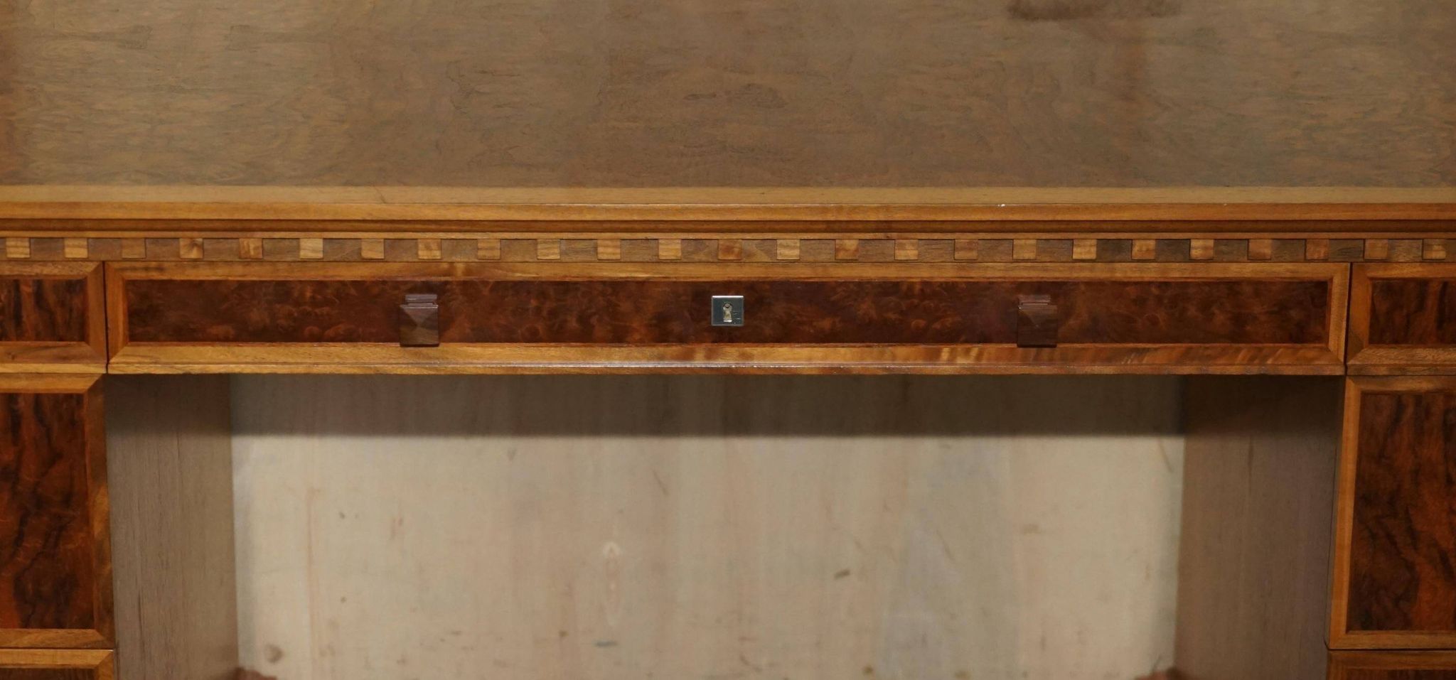 David Linley Burr walnut chest of drawers for light restoration.