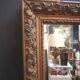 High and narrow mirror in gilded stucco late nineteenth century