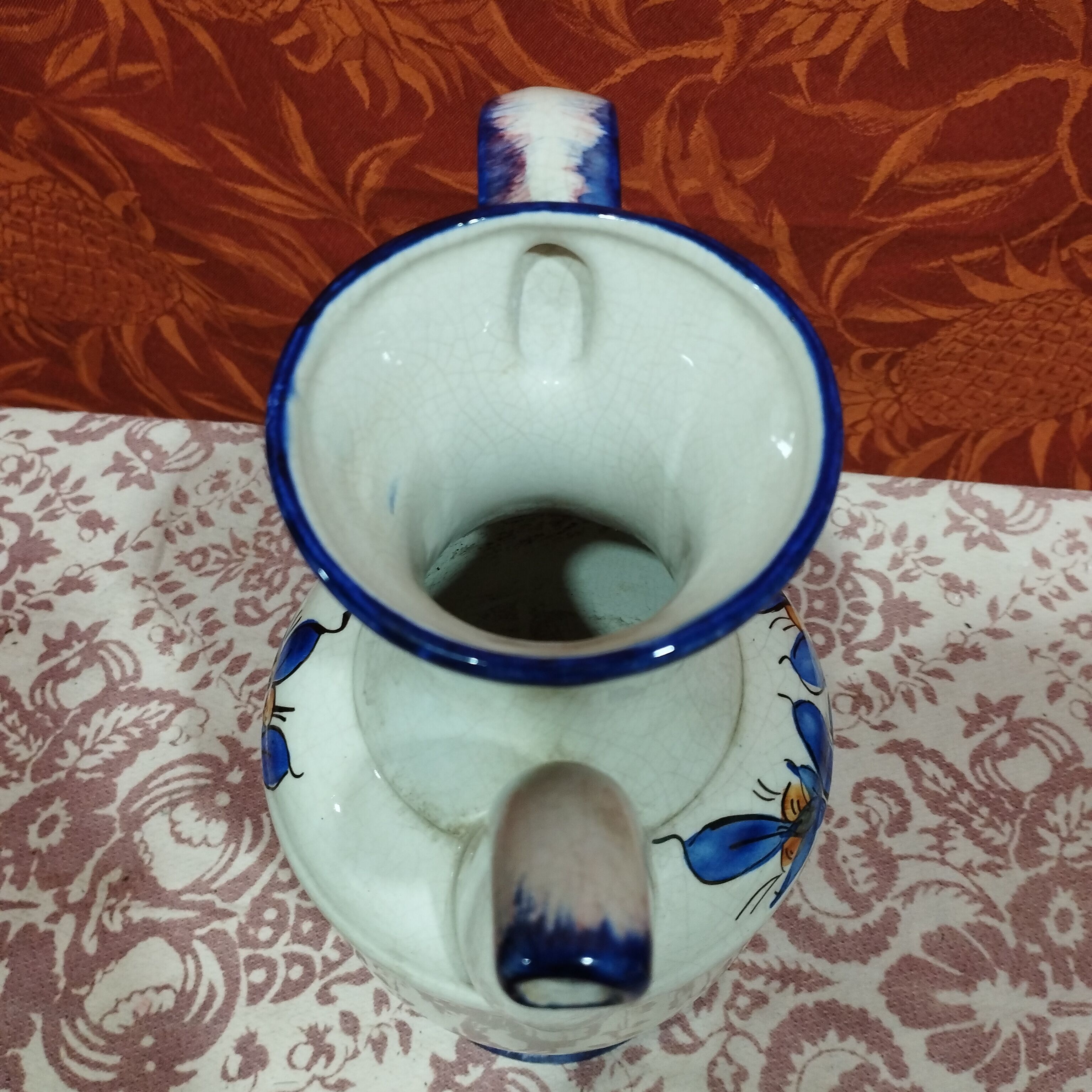 Hand-painted cracked ceramic pitcher