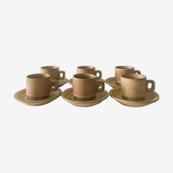 Stoneware coffee cups with saucers