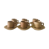Stoneware coffee cups with saucers